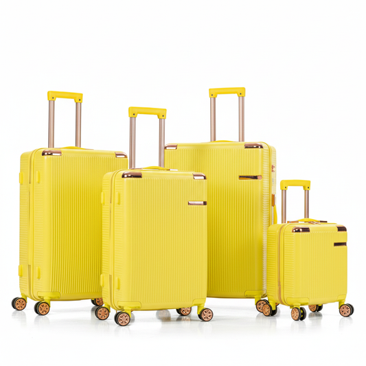 4-piece bright yellow ABS spinner luggage set with rose gold accents