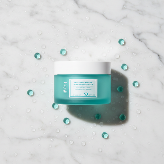Hoygi 5X Ceramide Moisturizer — marble flatlay with water droplets