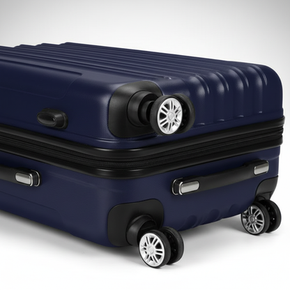 Close-up of navy blue suitcase spinner wheels and silver handle